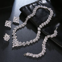 The Dazzling Set Is Handcrafted With Copper And Set With Zircon Stones.