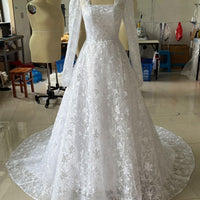 Embroidered Long Sleeve Trailing Wedding Dress