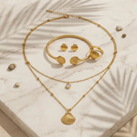 Women’s Gold Shell Jewelry Set – Stainless Steel Necklace, Bangle, Earrings & Ring | Everyday Home Deal